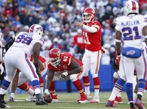 Nov 3, 2013; Orchard Park, NY, USA; Kansas City Chiefs quarterback Alex Smith (11) points to Buffalo Bills defensive tackle Marcell Dareus (99) during the second half at Ralph Wilson Stadium. Chiefs beat the Bills 23-13. Credit: Kevin Hoffman-USA TODAY Sports