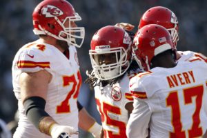 Dec 15, 2013; Oakland, CA, USA; Chiefs running back Jamaal Charles (25) is congratulated by teammates after catching a touchdown pass against the Oakland Raiders in the first quarter at O.co Coliseum. Credit: Cary Edmondson-USA TODAY Sports