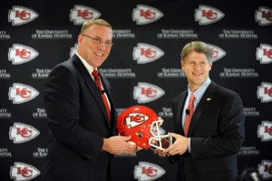 Jan 14, 2013; Kansas City, MO, USA; Kansas City Chiefs general manager John Dorsey (left) and chairman Clark Hunt pose for photos during the press conference announcing Dorsey's hiring at the University of Kansas Hospital Training Complex. Mandatory Credit: Denny Medley-USA TODAY Sports
