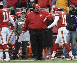 Nov 24, 2013; Kansas City, MO, USA; Kansas City Chiefs wide receiver Donnie Avery (17) is congratulated by coach Andy Reid after catching a touchdown pass against San Diego Chargers at Arrowhead Stadium. Mandatory Credit: John Rieger-USA TODAY Sports