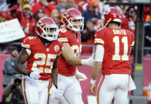 Dec 1, 2013; Kansas City, MO, USA; Kansas City Chiefs tight end Anthony Fasano (80) celebrates with running back Jamaal Charles (25) and quarterback Alex Smith (11) after catching a touchdown pass against the Denver Broncos at Arrowhead Stadium. Credit: John Rieger-USA TODAY Sports