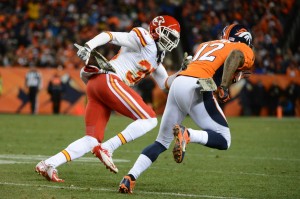 Nov. 17, 2013; Denver, CO, USA; Kansas City Chiefs defensive back Ron Parker (38, left) defends against Denver Broncos wide receiver Andre Caldwell (12) at Sports Authority Field at Mile High. Credit: Kyle Terada-USA TODAY Sports