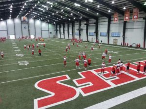 June 19, 2014; Kansas City, MO; General view of players warming up on final day of Chiefs minicamp at the team's training facility. Credit: Teope.