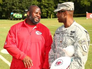 Aug. 14, 2014; St. Joseph, MO; Chiefs running backs coach Eric Bieniemy and Maj. Ivy Williams chat after practice. Photo used with permission by Chiefs PR. Credit: KCChiefs.com. 