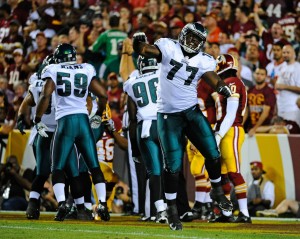 Sep 9, 2013; Landover, MD; Eagles defensive end Damion Square (77) reacts after the Eagles recorded a safety against the Washington Redskins at FedEX Field. Credit: Brad Mills-USA TODAY Sports