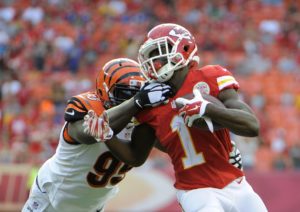 Aug 7, 2014; Kansas City, MO; Chiefs running back De'Anthony Thomas (1) is tackled by Bengals defensive end Wallace Gilberry (95) in the first half at Arrowhead Stadium. Credit: John Rieger-USA TODAY Sports