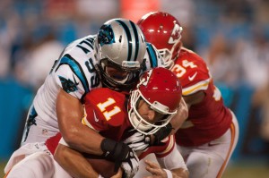 Aug 17, 2014; Charlotte, NC; Panthers middle linebacker Luke Kuechly (59) sacks Chiefs quarterback Alex Smith (11) during the second quarter at Bank of America Stadium. Credit: Jeremy Brevard-USA TODAY Sports