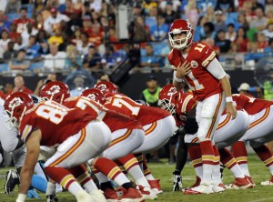 Aug 17, 2014; Charlotte, NC; Chiefs quarterback Alex Smith (11) calls out a signal against the Carolina Panthers at Bank of America Stadium. Credit: Sam Sharpe-USA TODAY Sports