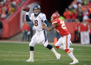 Dec 1, 2013; Kansas City, MO; Chiefs safety Eric Berry (29) pressures Broncos quarterback Peyton Manning (18)  at Arrowhead Stadium. Credit: Kirby Lee-USA TODAY Sports
