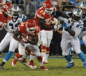 Aug 17, 2014; Charlotte, NC; Chiefs guard Zach Fulton (73) makes a block for running back Knile Davis (34) against the Panthers at Bank of America Stadium. Credit: Sam Sharpe-USA TODAY Sports