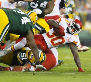 Aug 28, 2014; Green Bay, WI; Chiefs running back Joe McKnight (30) gains yards in the preseason finale against the Green Bay Packers at Lambeau Field. Credit: Jeff Hanisch-USA TODAY Sports