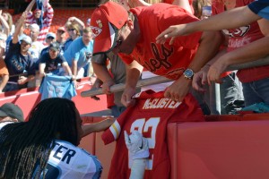 Sep 7, 2014; Kansas City, MO; Titans running back Dexter McCluster (22) signs autographs for fans after the game against at Arrowhead Stadium. Credit: Denny Medley-USA TODAY Sports 