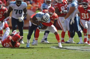 Sep 7, 2014; Kansas City, MO; Chiefs strong safety Eric Berry (29) tackles Tennessee Titans running back Shonn Greene (23) at Arrowhead Stadium. Credit: Denny Medley-USA TODAY Sports