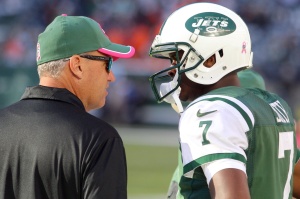 Oct 12, 2014; East Rutherford, NJ; Jets head coach Rex Ryan talks with quarterback Geno Smith (7) at MetLife Stadium. Credit: Brad Penner-USA TODAY Sports