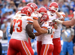Oct 19, 2014; San Diego, CA; Chiefs teammates celebrate with kicker Cairo Santos (5) after he kicked a 48-yard field goal with 21 seconds left in the game to defeat the Chargers 23-20 at Qualcomm Stadium. Credit: Jayne Kamin-Oncea-USA TODAY Sports