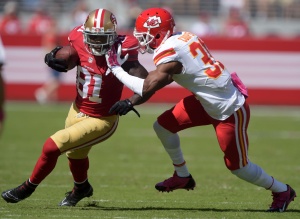 Oct 5, 2014; Santa Clara, CA, USA; Chiefs cornerback Marcus Cooper (31) defends against San Francisco 49ers receiver Anquan Boldin (81) at Levi's Stadium. Credit: Kirby Lee-USA TODAY Sports