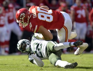 Nov 2, 2014; Kansas City, MO, USA; Chiefs tight end Anthony Fasano (80) catches a pass and is tackled by New York Jets cornerback Marcus Phillips (22) at Arrowhead Stadium. Credit: Denny Medley-USA TODAY