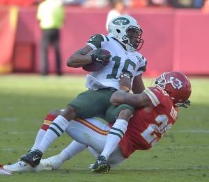 Nov 2, 2014; Kansas City, MO; Chiefs strong safety Eric Berry (29) tackles Jets wide receiver Percy Harvin (16)  during the second half at Arrowhead Stadium. Credit: Denny Medley-USA TODAY Sports