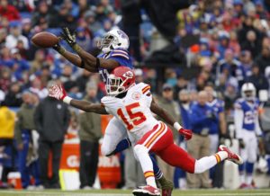 Nov 9, 2014; Orchard Park, NY; Kansas City Chiefs wide receiver A.J. Jenkins (15) and Buffalo Bills cornerback Leodis McKelvin (21) dive for a pass during the first half at Ralph Wilson Stadium. Credit: Kevin Hoffman-USA TODAY Sports