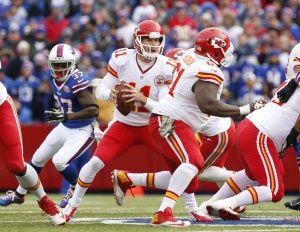 Nov 9, 2014; Orchard Park, NY; Chiefs quarterback Alex Smith (11) looks to pass against the Bills at Ralph Wilson Stadium. Credit: Kevin Hoffman-USA TODAY Sports