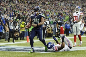 Nov 9, 2014; Seattle; Seahawks running back Marshawn Lynch (24) celebrates after scoring a touchdown against the New York Giants at CenturyLink Field. Credit: Steven Bisig-USA TODAY Sports