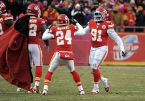 Nov 16, 2014; Kansas City, MO; Chiefs outside linebacker Tamba Hali (91) celebrates with defensive back Kelcie McCray (24) after the Chiefs stopped the Seattle Seahawks on fourth down in the second half at Arrowhead Stadium. Credit: John Rieger-USA TODAY Sports
