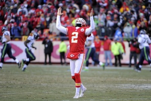 Nov 16, 2014; Kansas City, MO; Chiefs punter Dustin Colquitt (2) celebrates after his punt was downed at the 4-yard line against the Seattle Seahawks in the second half at Arrowhead Stadium. Mandatory Credit: John Rieger-USA TODAY Sports