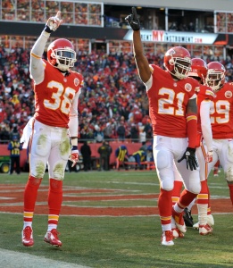 Nov 16, 2014; Kansas City, MO; Chiefs cornerback Sean Smith (21) and free safety Husain Abdullah (39) celebrate after a goal-line stand during the second half against the Seattle Seahawks at Arrowhead Stadium. Credit: Denny Medley-USA TODAY Sports