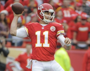 Dec 14, 2014; Kansas City, MO; Chiefs quarterback Alex Smith (11) throws the ball against the Oakland Raiders in the first half at Arrowhead Stadium. Credit: John Rieger-USA TODAY Sports