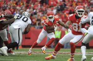 Dec 14, 2014; Kansas City, MO; Chiefs running back Jamaal Charles (25) carries the ball against the Oakland Raiders in the first half at Arrowhead Stadium. Credit: John Rieger-USA TODAY Sports