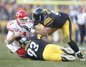 Dec 21, 2014; Pittsburgh, PA, USA; Steelers outside linebacker Jason Worilds (93) and defensive end Cameron Heyward (97) converge to sack Chiefs quarterback Alex Smith (11) at Heinz Field. Credit: Charles LeClaire-USA TODAY Sports