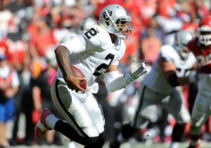 Oct 13, 2013; Kansas City, MO; Then-Raiders quarterback Terrelle Pryor (2) runs the ball during the second half against the Chiefs at Arrowhead Stadium. Credit: Denny Medley-USA TODAY Sports