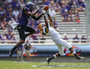 Sep 7, 2013; Fort Worth, TX; TCU Horned Frogs safety Chris Hackett (1) intercepts the ball from Southeastern Louisiana running back Xavier Roberson (1) at Amon G. Carter Stadium. Credit: Kevin Jairaj-USA TODAY Sports