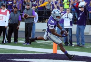 Nov 29, 2014; Manhattan, KS; Kansas State wide receiver Tyler Lockett (16) scores a touchdown against the Kansas Jayhawks at Bill Snyder Family Stadium. Credit: Scott Sewell-USA TODAY Sports