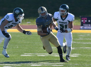 Oct. 14, 2014; Emporia, KS: Emporia State WR Austin Willis (25) makes a play between Northwest Missouri defenders at Welch Stadium. Photo used with permission from Emporia State sports information. Credit: James R. Garvey