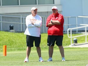 May 18, 2015; Kansas City, MO; Chiefs general manager John Dorsey (left) and coach Andy Reid (right) observe the action on the final day of rookie minicamp. Photo used with permission from Chiefs PR. Credit: KCChiefs.com
