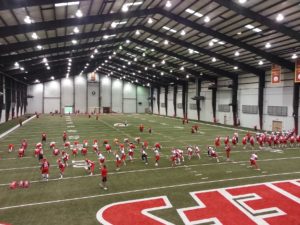 June 3, 2015; Kansas City, MO: General view of the Chiefs warming up indoors on Day Five of OTAs at the team's training facility. Credit: Teope