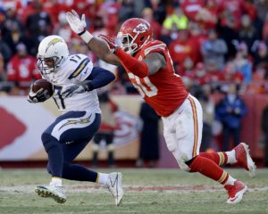 Kansas City Chiefs outside linebacker Justin Houston (50) sacks San Diego Chargers quarterback Philip Rivers (17) during the second half of an NFL football game Sunday, Dec. 28, 2014, in Kansas City, Mo. Kansas City won 19-7. (AP Photo/Charlie Riedel)