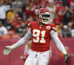 Kansas City Chiefs outside linebacker Tamba Hali (91) celebrates a play during the second half of their NFL football game against the Oakland Raiders in Kansas City, Mo., Sunday, Dec. 14, 2014. (AP Photo/Reed Hoffmann)