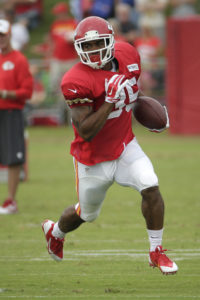 Kansas City Chiefs running back Charcandrick West (35) runs during training camp NFL football practice Friday, Aug. 1, 2014, in St. Joseph, Mo. (AP Photo/Charlie Riedel)