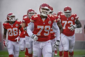 Kansas City Chiefs tackle Donald Stephenson (79) runs onto the field with the Chiefs for their game against the Oakland Raiders during the first half of their NFL football game in Kansas City, Mo., Sunday, Dec. 14, 2014. (AP Photo/Reed Hoffmann)