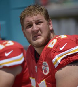 Kansas City Chiefs center Eric Kush (64) watches from the bench during the first half of an NFL football game against the Jacksonville Jaguars in Jacksonville, Fla., Sunday, Sept. 8, 2013.(AP Photo/Phelan M. Ebenhack)