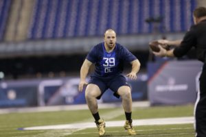 Missouri offensive lineman Mitch Morse runs a drill at the NFL football scouting combine in Indianapolis, Friday, Feb. 20, 2015. (AP Photo/David J. Phillip)