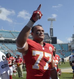 Kansas City Chiefs defensive end Mike Catapano (77) acknowledges fans after a 28-2 win over the Jacksonville Jaguars in an NFL football game in Jacksonville, Fla., Sunday, Sept. 8, 2013.(AP Photo/Phelan M. Ebenhack)