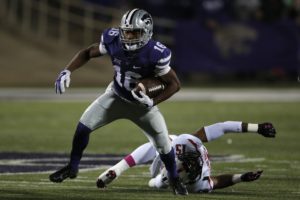 Kansas State wide receiver Tyler Lockett (16) breaks away from Texas Tech defensive back Keenon Ward (15) during the second half of an NCAA college football game in Manhattan, Kan., Saturday, Oct. 4, 2014. (AP Photo/Orlin Wagner)