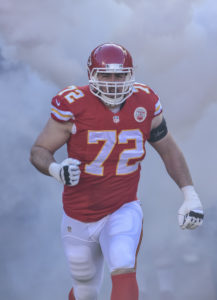 Kansas City Chiefs tackle Eric Fisher (72) is introduced prior to the start of their NFL football game in Kansas City, Mo., Sunday, Dec. 28, 2014. (AP Photo/Reed Hoffmann)