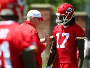 May 27, 2015; Kansas City, MO; Chiefs rookie wide receiver Chris Conley (17) listens as coach Andy Reid offers instructions on Day Two of OTAs. Photo used with permission from Chiefs PR. Credit: KCChiefs.com