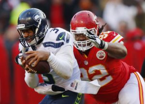 Nov. 16, 2014; Kansas City, MO; Chiefs defensive tackle Dontari Poe (92) sacks Seattle Seahawks quarterback Russell Wilson (3) in the second half at Arrowhead Stadium. (AP Photo/Ed Zurga)