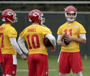 Kansas City Chiefs quarterbacks Alex Smith (11), Chase Daniel (10) and Aaron Murray (7) during an  organized team activity on May 28, 2015 in Kansas City, Mo. (AP Photo/Charlie Riedel)