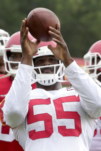Aug. 5, 2015; St. Joseph, MO; Chiefs linebacker Dee Ford (55) catches a ball during training camp. (AP Photo/Charlie Riedel)